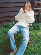 CROPPED CABLE TURTLENECK IN CREAM