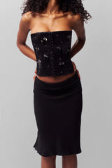 EMBELLISHED SATIN COREST IN BLACK